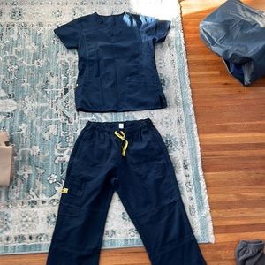 Wonderwink scrubs navy blue size medium for top and large bottom.